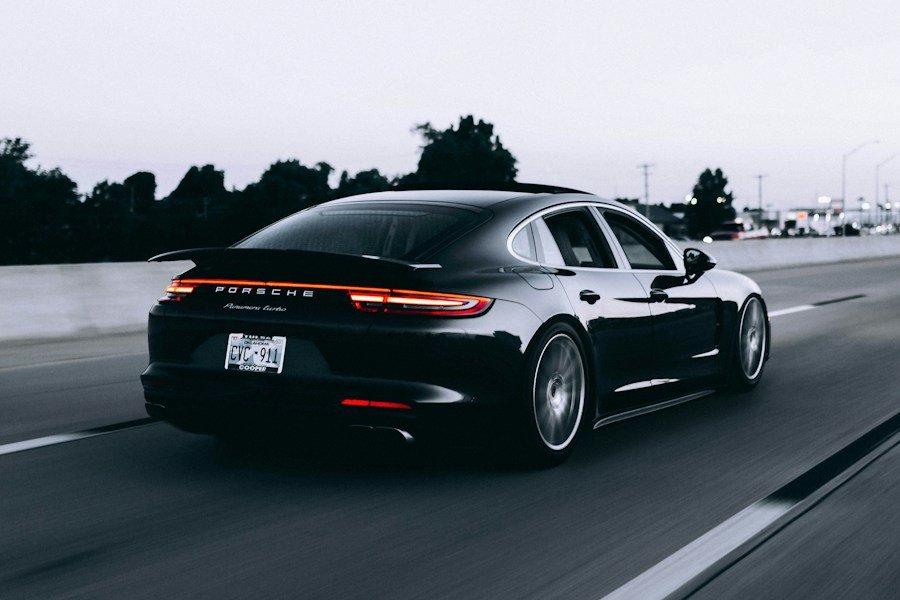 Car cruising along an open highway